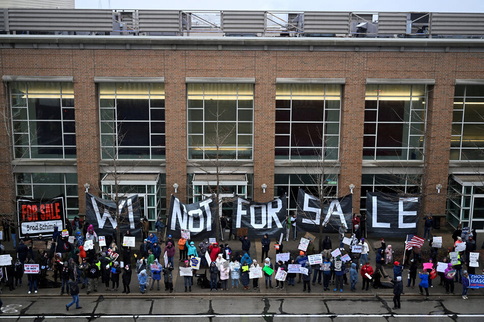 Protesters demonstrated against Musk's visit to Green Bay and his interference in the election.