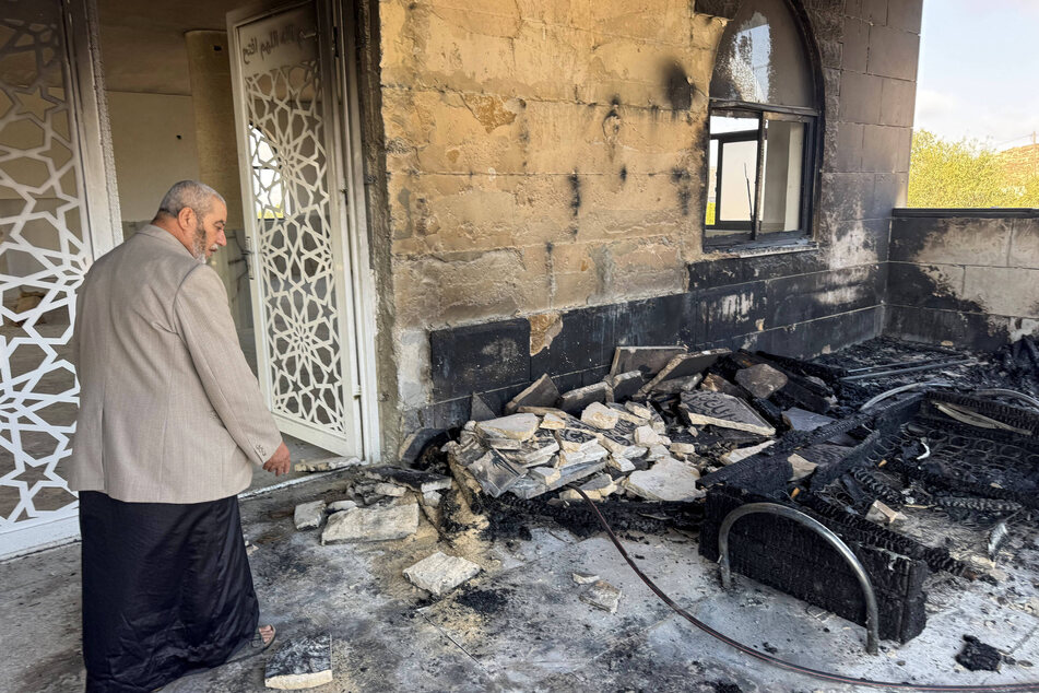 Israeli settlers torch two mosques in West Bank amid escalating attacks on Palestinians
