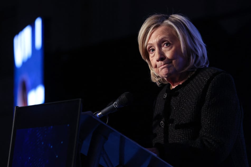 Former US Secretary of State Hillary Clinton speaks on stage as she attends The World Forum 2026 on the Future of Democracy, AI/Tech, and Humankind as part of the Cinema for Peace events in Berlin, Germany, on February 16, 2026.