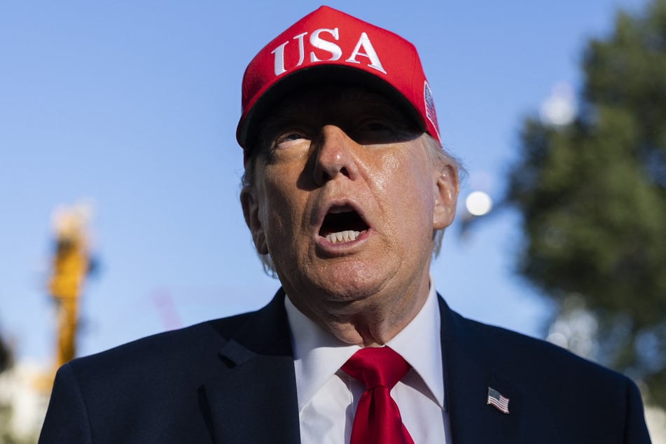 President Donald Trump speaks to the media on the South Lawn as he returns to the White House on Tuesday. The US leader is seeking to turn his luxury golf course in Florida into his very own Camp David-style presidential retreat.