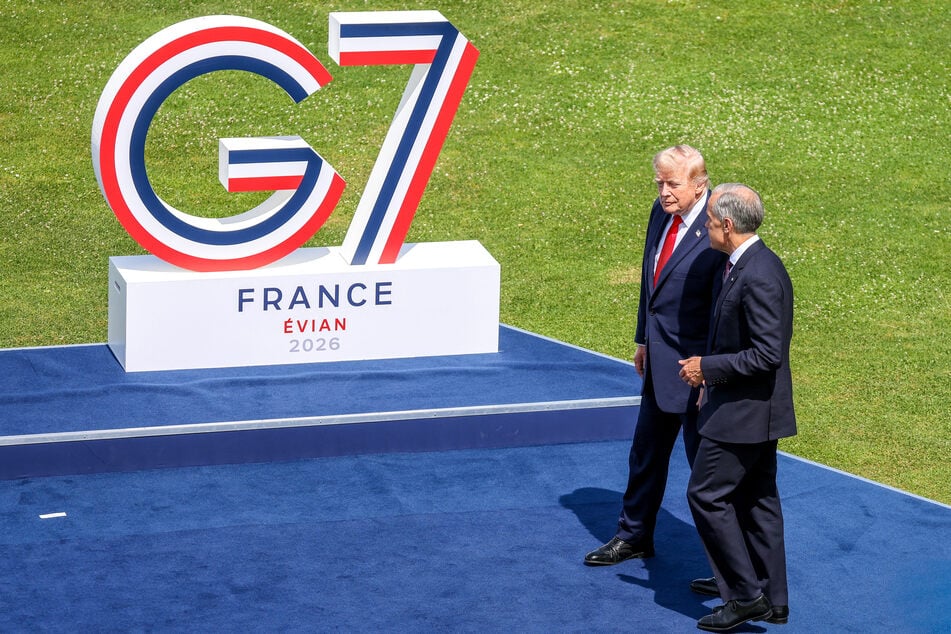 President Donald Trump and Canadian Prime Minister Mark Carney speak before posing for a photograph during this week's G7 summit in France.