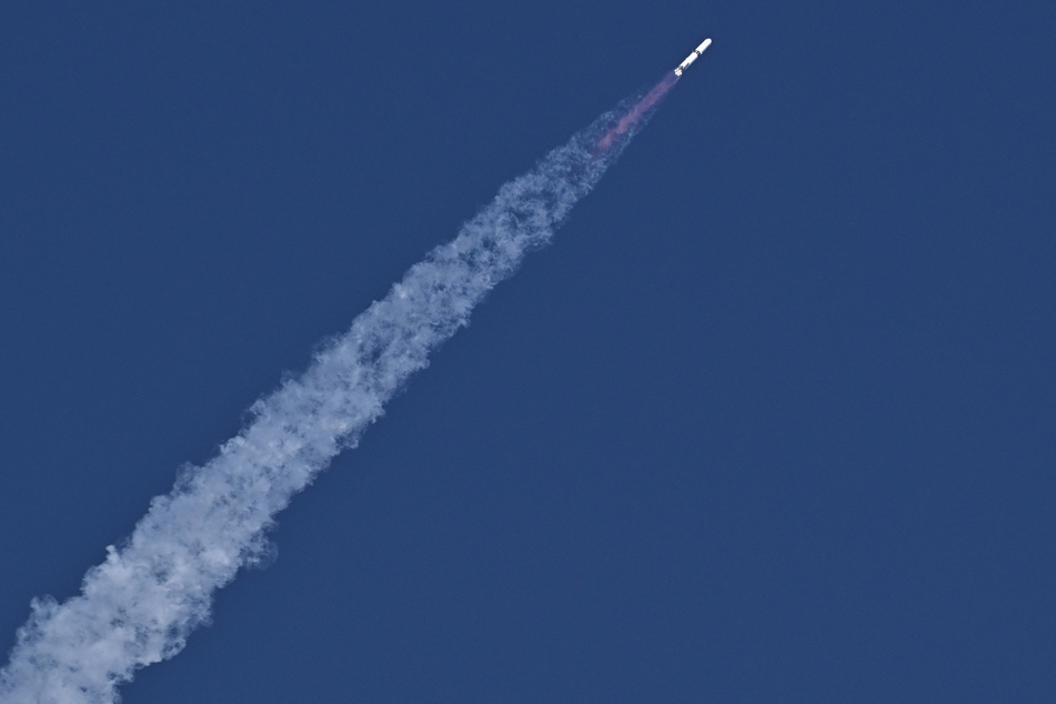 A Blue Origin New Glenn rocket carrying two satellites for NASA's EscaPADE mission to orbit Mars lifts off into space from Cape Canaveral, Florida, on November 13, 2025.
