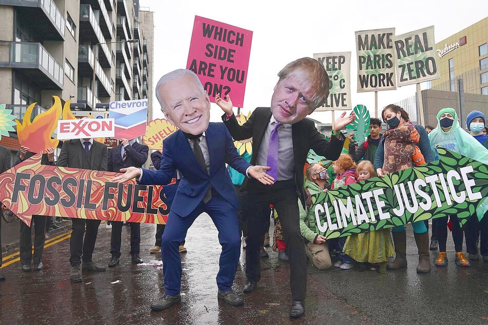 November 12 saw more protests, with one group asking which side President Joe Biden and Prime Minister Boris Johnson are even on.