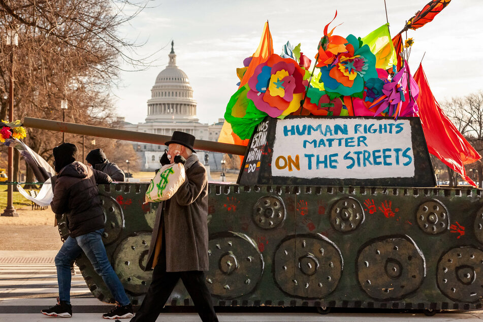 Protesters blocked access to the area around the Capitol to protest the US' enormous military spending.