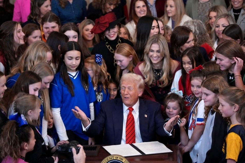 President Donald Trump signed a "No Men in Women's Sports" executive order targeting trans athletes last year. His administration's latest attack on the trans community has come under fire from scientists and other experts.