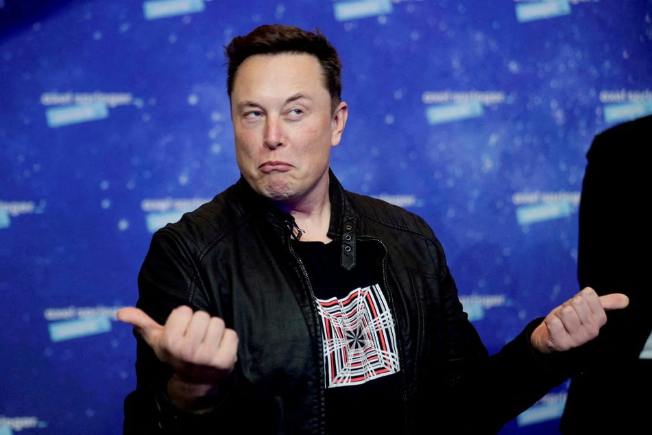 Elon Musk has been accused of making one of the website's senior executives a "target of harassment and threats."