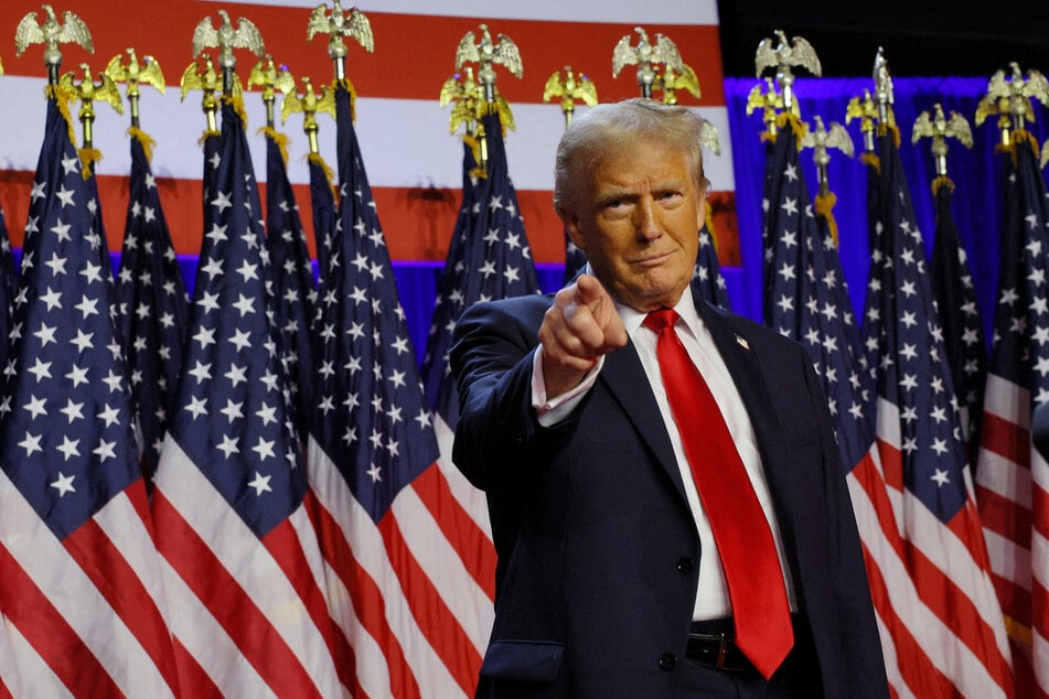 Donald Trump takes the stage to address supporters after winning the 2024 presidential election, at the Palm Beach County Convention Center in West Palm Beach, Florida.