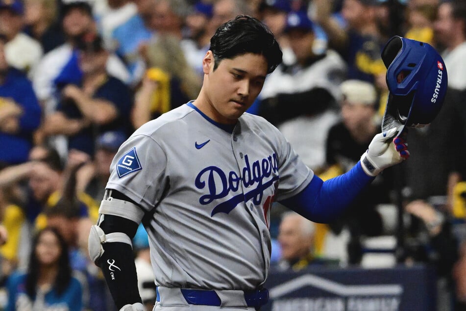 Los Angeles Dodgers pitcher Shohei Ohtani reacts during the eighth inning against the Milwaukee Brewers in game one of the NLCS. He will not be benched in game three, according to the team's manager.