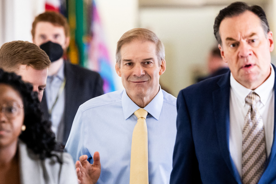 Jim Jordan (c.) won the Republican vote 124-81 to earn the nomination for House Speaker.