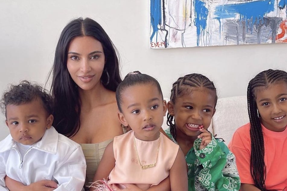 On Sunday, Kim Kardashian shared a clip on her Instagram story of Phillip Cornish serenading her home with holiday music.