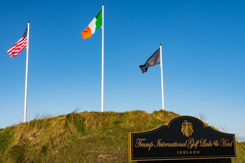Irish police opened a probe into "criminal damage" at a golf course owned by US President Donald Trump, as his son Eric visited Scotland for business talks.