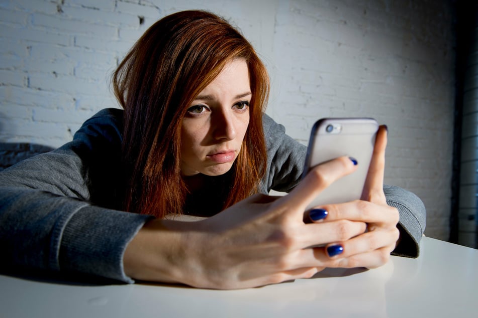People who "doomscroll" through pandemic news headlines are more likely to be in a negative mood, the study found (stock image).