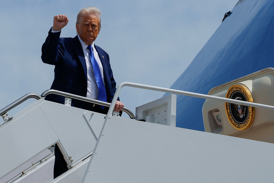 Donald Trump boards Air Force One as he prepares to embark on a tour of the Gulf region, including a visit to Qatar.