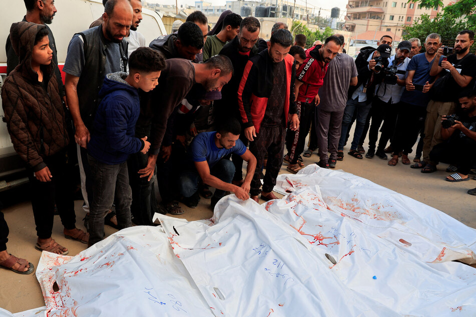 Israeli forces kill dozens of Palestinians near US-backed aid center as UN slams war crimes
