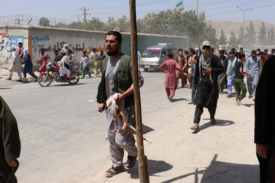 Thousands of Afghans rushed onto the tarmac at Kabul Airport, desperately seeking a means of escape from the country.