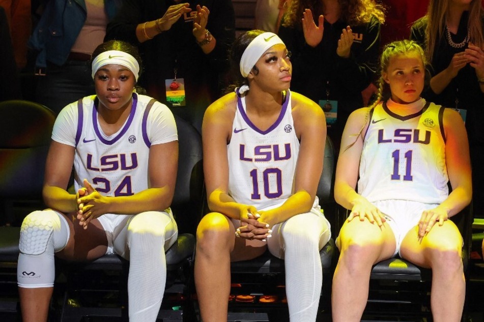While Coach Mulkey didn't reveal her reasoning for benching Angel Reese (c.), fans couldn't help but flood the internet with their own conclusions.