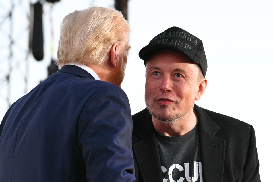 In a recent interview, Elon Musk (r.) revealed his work with the Department of Government Efficiency is nearly done, and is expected to end in May.
