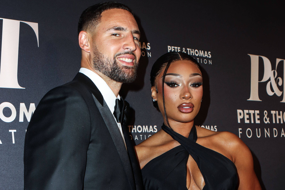 Megan Thee Stallion was Klay Thompson's (l.) first mate during their recent fishing date.