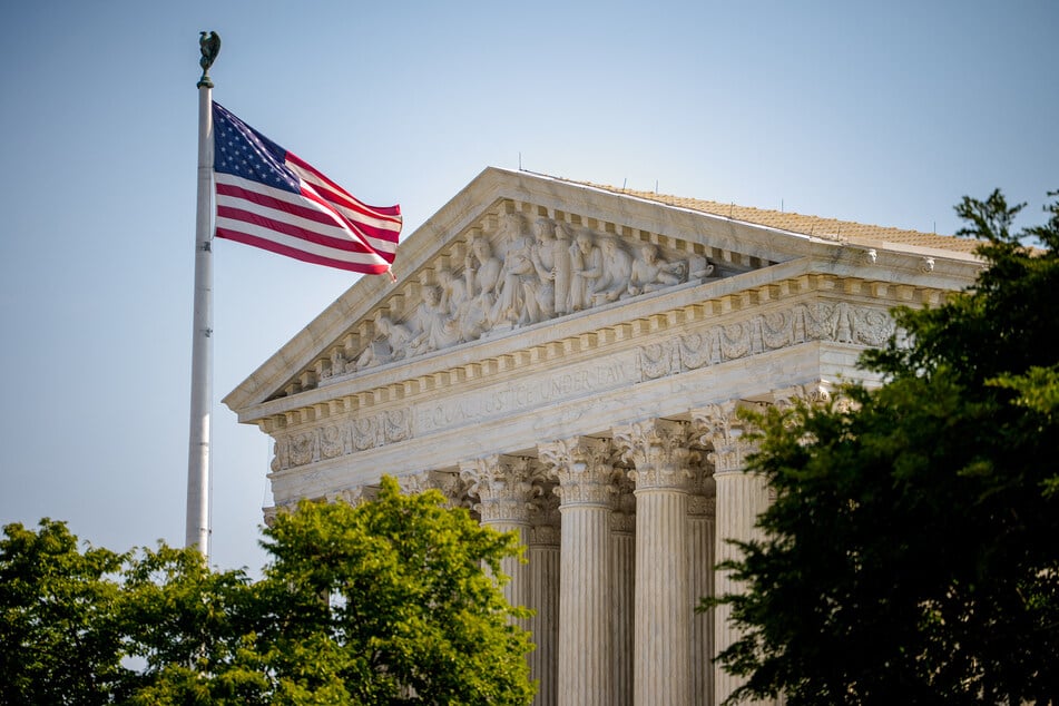 The conservative-majority Supreme Court lifted a stay on an executive order seeking to restrict mail-in voting.