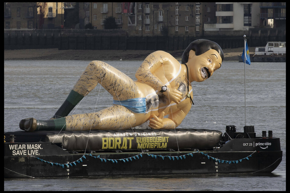Borat is back: 40-foot-tall plastic doll floating down the Thames