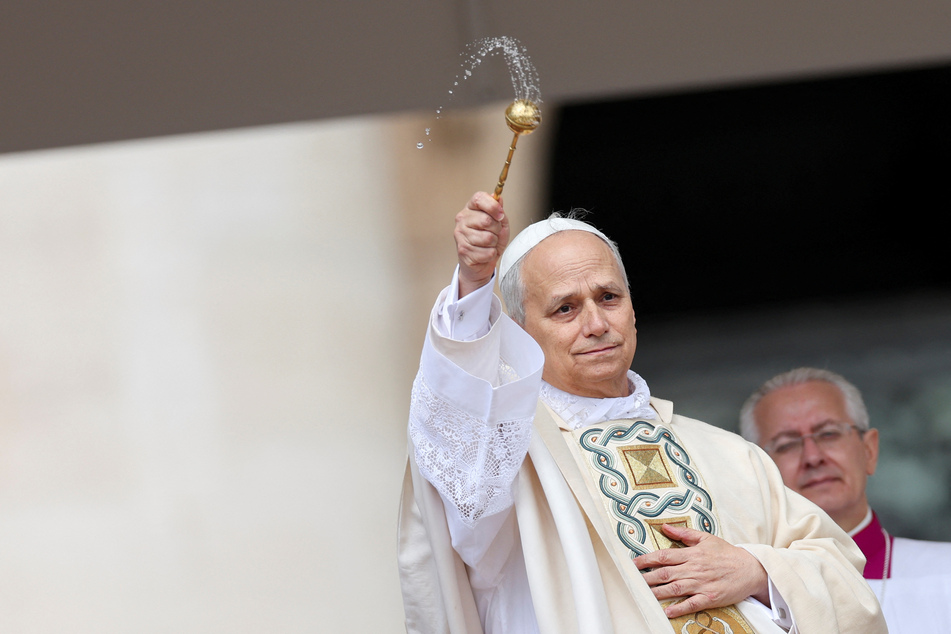 Pope Leo XIV blesses the faithful during his inaugural mass in St. Peter's Square at the Vatican on May 18, 2025.