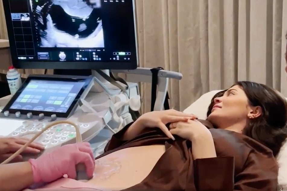 Kylie Jenner confirms baby bombshell with Travis Scott in emotional video!