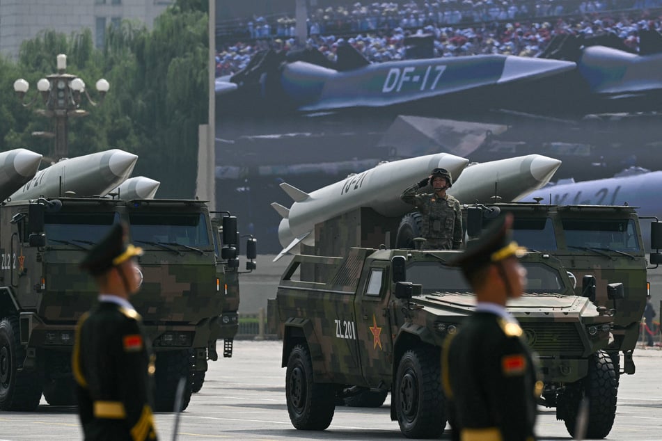 The US voiced alarm after China's military test-fired a long-range missile into the Pacific Ocean, accusing Beijing of nuclear proliferation.