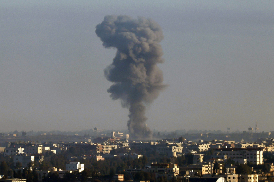 Smoke billows above the Syrian Governorate of Quneitra during Israeli bombardment on December 9, 2024.