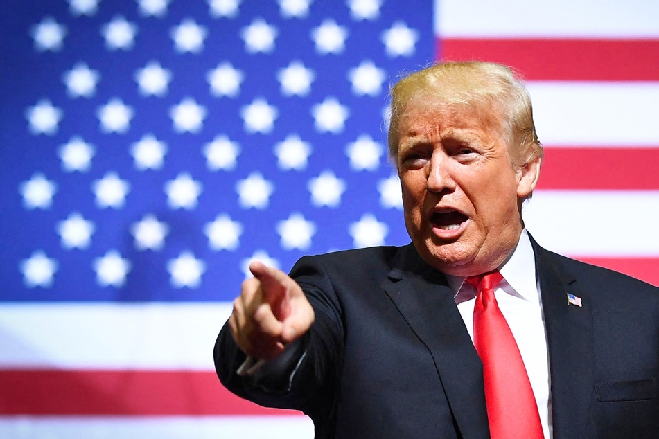 Trump touts biggest mass deportation ever in extreme speech at NRA event
