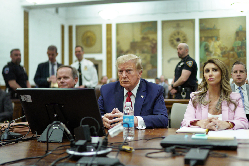 Donald Trump (c) returned to court on Thursday as a spectator in his New York fraud trial.