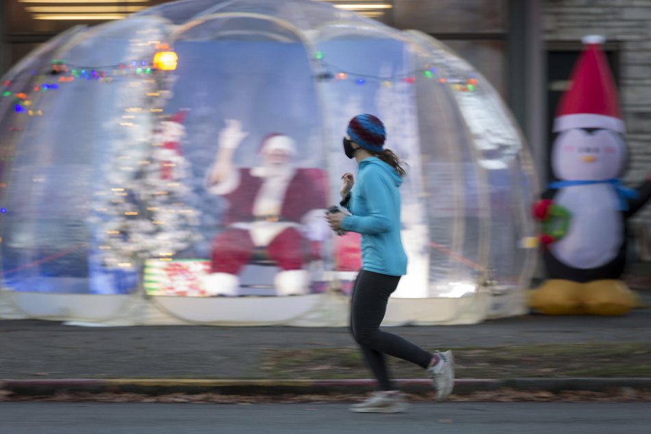 Christmas during a pandemic has led to some innovative solutions, such as Seattle's bubble Santa.