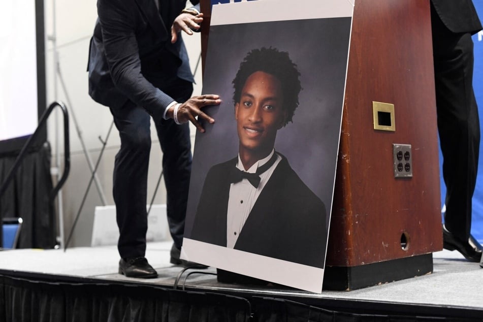 A photo of Nolan Wells is seen in front of a podium during the 117th NAACP National Convention at McCormick Place in Chicago, Illinois, on July 22, 2026.