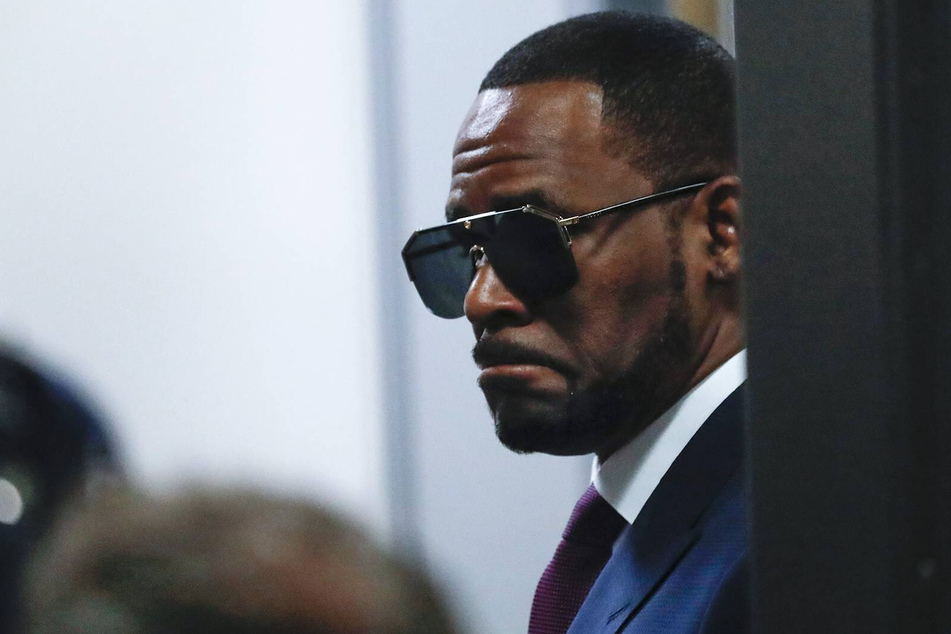 R. Kelly associate pleads guilty to trying to bribe witness