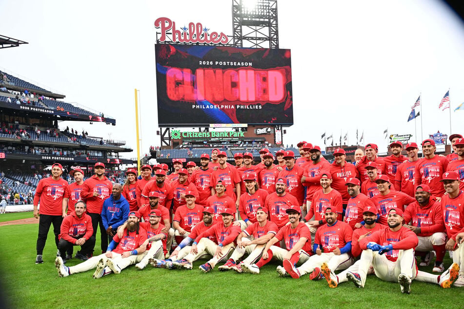 The Philadelphia Phillies gather for a team photo after clinching a wild card spot in the postseason with a win against the Tampa Bay Rays at Citizens Bank Park.
