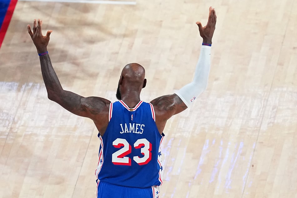 LeBron James #23 of the Philadelphia 76ers reacts during the fourth quarter of a game against the Cleveland Cavaliers at Xfinity Mobile Arena on Thursday. The victory marked the biggest comeback of LeBron's historic career.