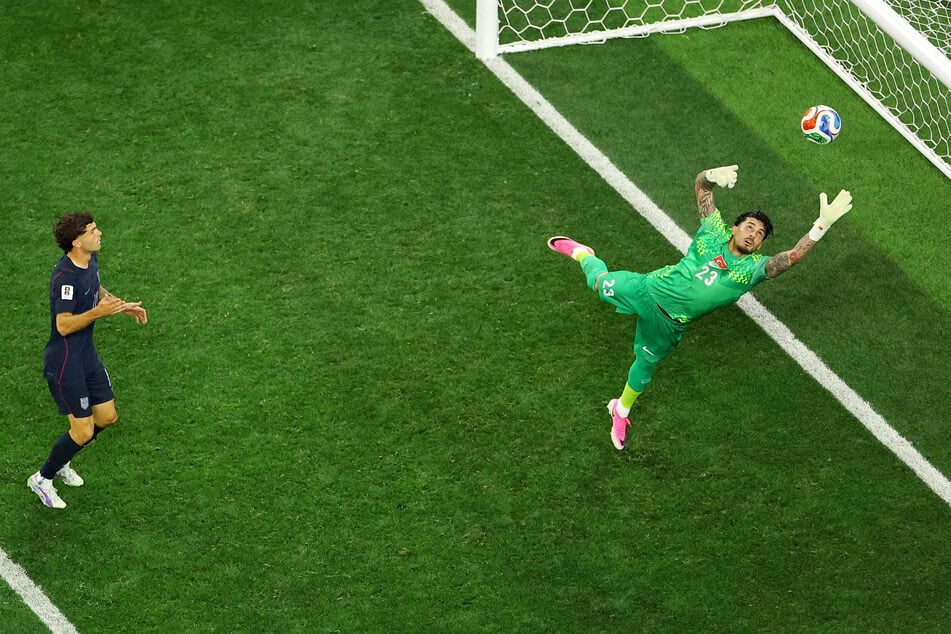 Turkey's Ugurcan Cakir makes a save after a shot from the USMNT's Christian Pulisic during their World Cup Group D match on June 25, 2026.