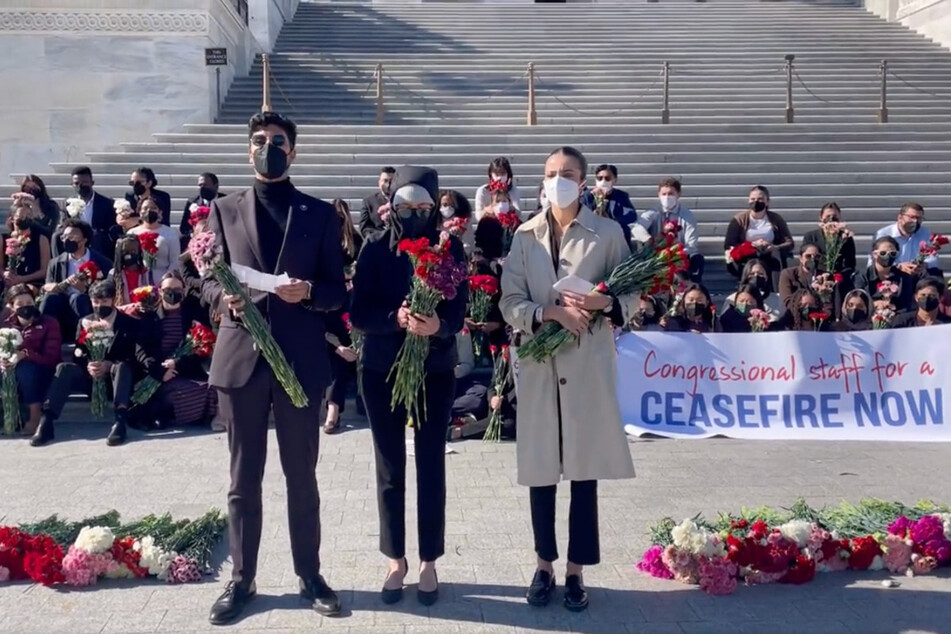 Congressional staffers participate in a walkout in support of a ceasefire in the ongoing Israel-Gaza conflict.