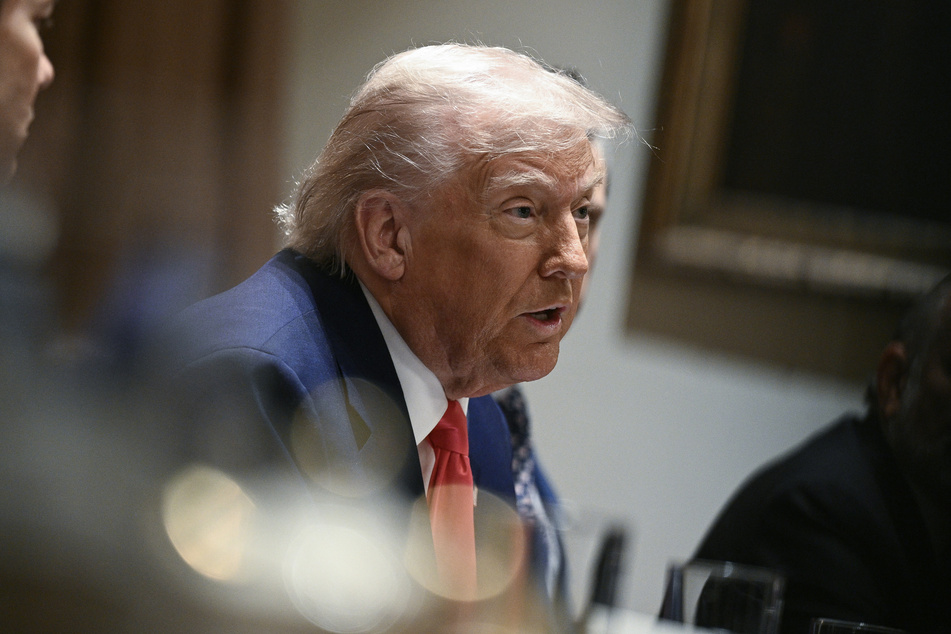 US President Donald Trump speaks during a cabinet meeting in the Cabinet Room of the White House on Thursday, in Washington, DC.