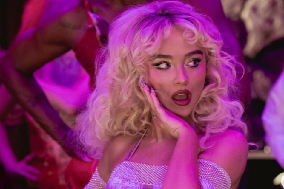 Sabrina Carpenter spills about secret mystery man on her scandalous album cover