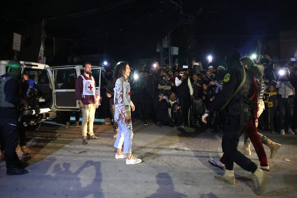 The Israeli hostages, all of them women, were handed over by masked and armed fighters from Hamas and Islamic Jihad to the care of Red Cross officials.