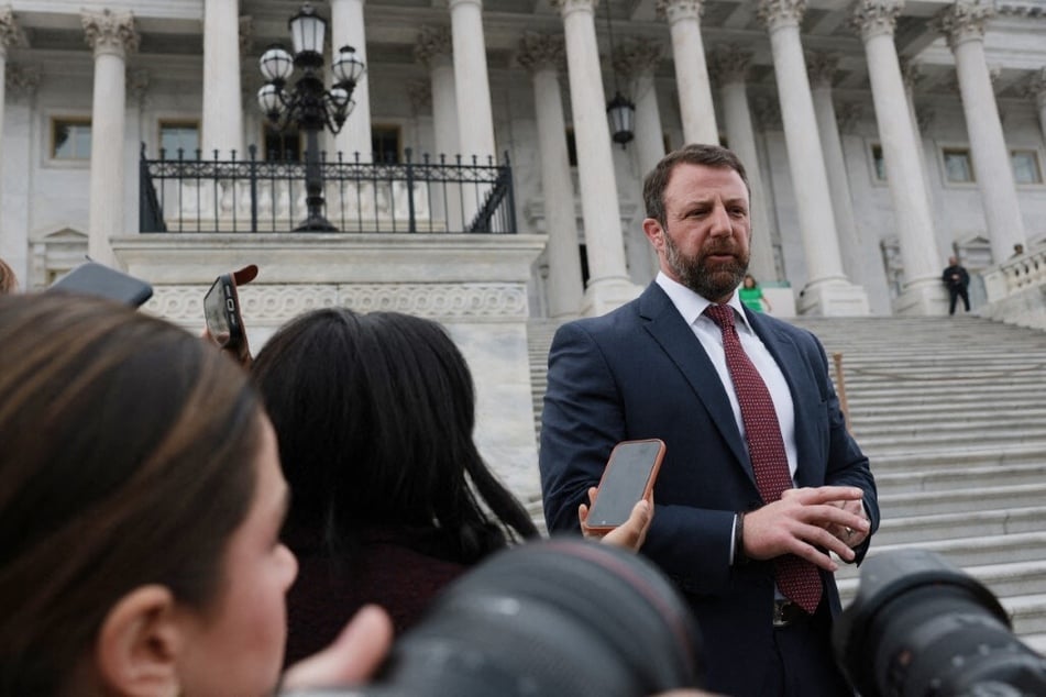 Homeland Security Secretary Markwayne Mullin speaks to reporters outside the US Capitol Building on March 5. Mullin replaced Noem after she was demoted earlier this year.