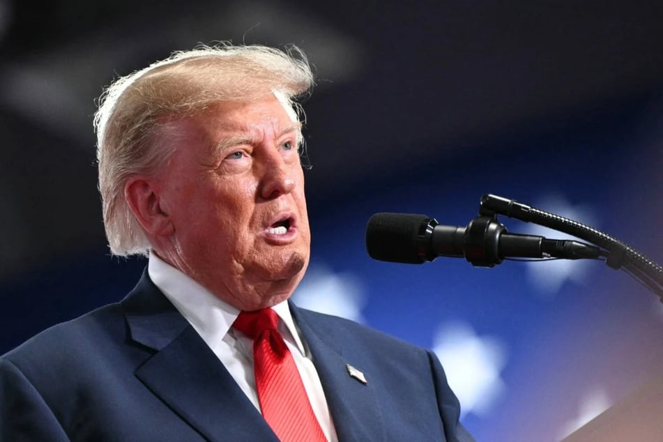 President Donald Trump speaks at a campaign rally in Syracuse, New York, on October 9. On Tuesday, a bipartisan group of 12 Senators sent a letter urging Trump to end his controversial diesel deal with Russia.