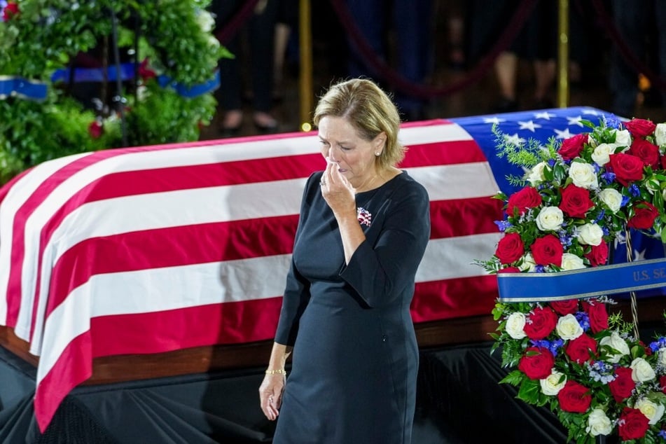 Senator Darline Graham mourns near the casket during a Congressional tribute to late Senator Lindsey Graham in the Rotunda of the US Capitol in Washington DC on July 28.