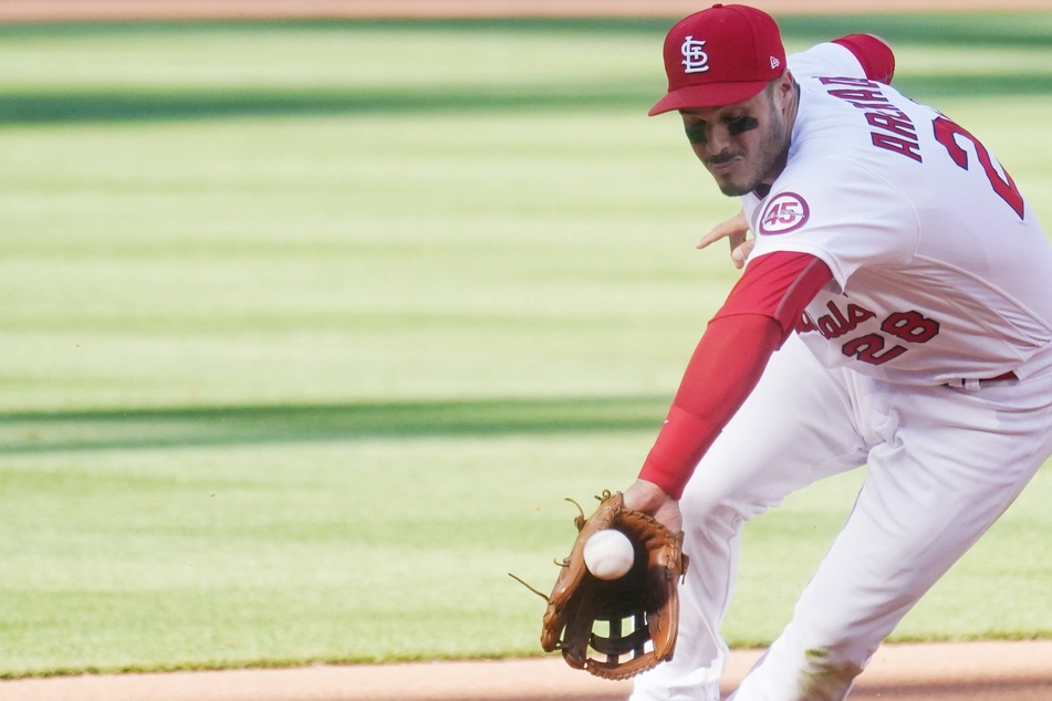 MLB: The Cardinals outlast a late rush by the Rockies to win at home