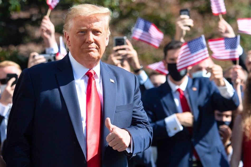 Donald Trump walking to Marine One prior to departing from the South Lawn of the White House in Washington DC on October 22, 2020.