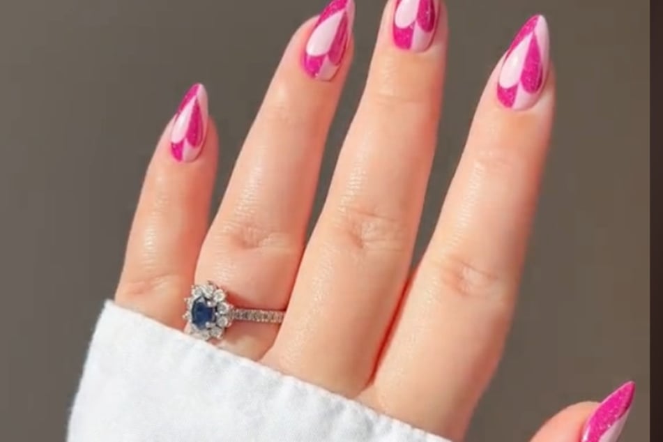 Why just stick with one color this V-day? TikToker Nailsbycalliemarie offers a cute heart-inspired design that can be done with any shade.
