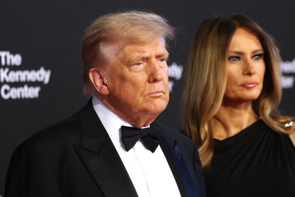 Trump brushes off performer boycott as he attends Les Mis at Kennedy Center