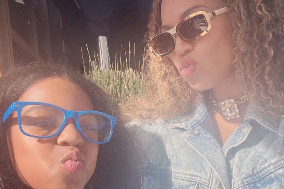Beyoncé (r.) dished on how her daughter Blue Ivy (l.) was affected by fans mocking her early performances in the Renaissance World Tour.