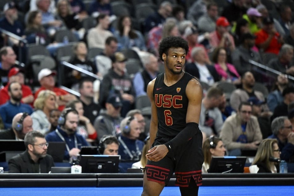 Bronny James' future at USC could take a new turn amid rumors that basketball head coach Andy Enfield may potentially leave the program.