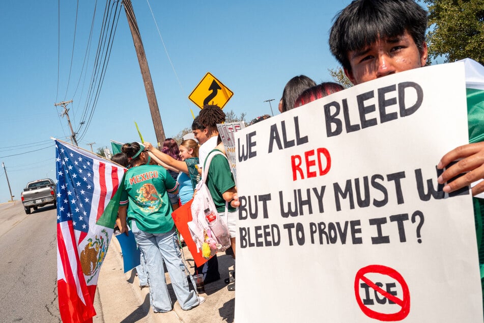 High school students protest against ICE outside the municipal court in Pflugerville, Texas on Tuesday. The shooting of Garces Perez has fueled further outrage against US immigration operations.